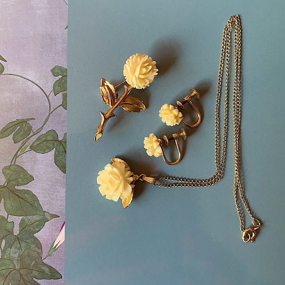 12k Gold Filled Celluloid Flowers Necklace Earring Set; and Golden Tone brooch.